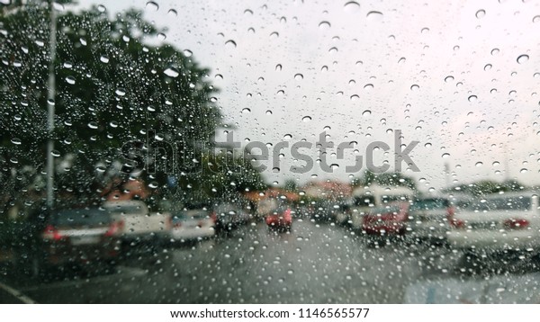 A\
water from rain on the window car. Droplets on glass.\
