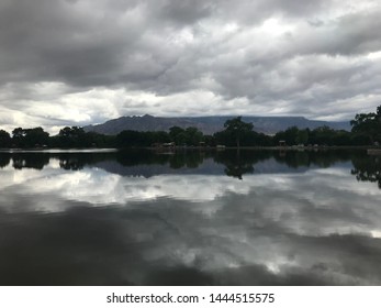 Water Reflection With Albuquerque Sandia Mountains  In The Background 