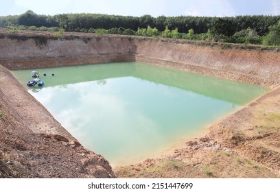 Water Reservoir For Irrigation In Agriculture. Pond For Aggregate Agriculture.