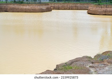 Water Reservoir For Irrigation In Agriculture. Pond For Aggregate Agriculture.