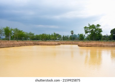 Water Reservoir For Irrigation In Agriculture. Pond For Aggregate Agriculture.