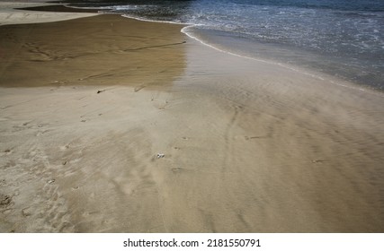 Water Ripples On The Beach, Picture Taken From A High Angle