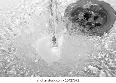 Water Running Down In Drain