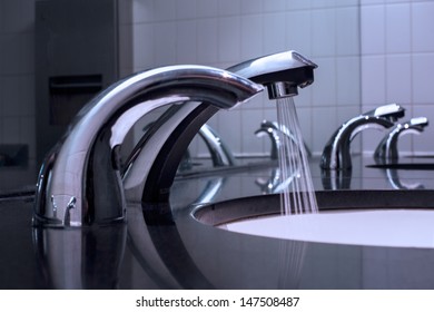 Water Running Down From Faucet