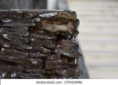 Water Running Down Rock Wall