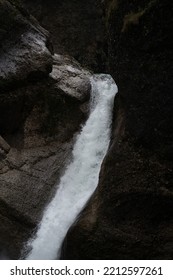 Water Running Down A Rocky Cliff