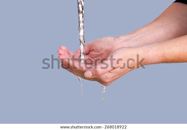 Water Running Into Hands Stock Photo (Edit Now) 268018922