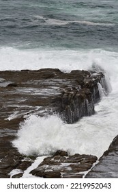 Water Running Off Coastal Rocks