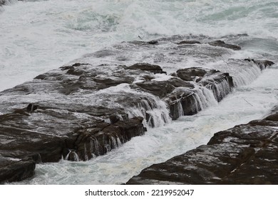 Water Running Off Coastal Rocks