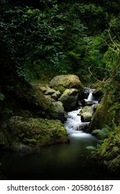 Water Running Through Rocks In A Creek.