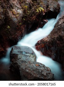 Water Running Through Rocks In A Creek.
