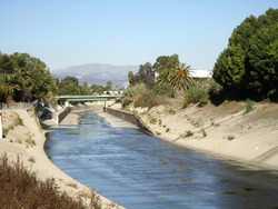 Water Runs Along Cement Water Canel In Culver City LA, California.
