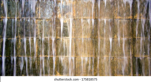 Water Runs Down A Tiled Wall