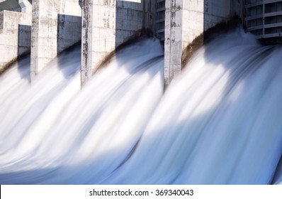 Water Rushing Out Of Open Gates Of A Hydro Electric Power Station In Long Exposure