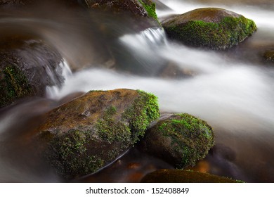 Water Rushing Over Stones At Roaring Fork River.