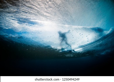 Water shot surfer and wave 