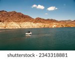 Water ski boat on a lake with a low water line at Lake Mead Nevada in August 2005