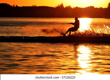 Water Skier Silhouetted by Sunset