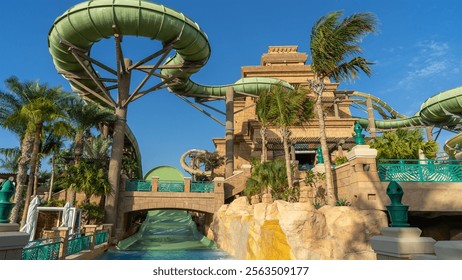 Water slides at Aquaventure Water Park. The largest water theme park in Middle East, Dubai, United Arab Emirates.