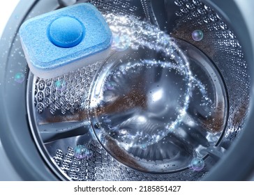 Water Softener Tablet In Washing Machine Drum, Closeup