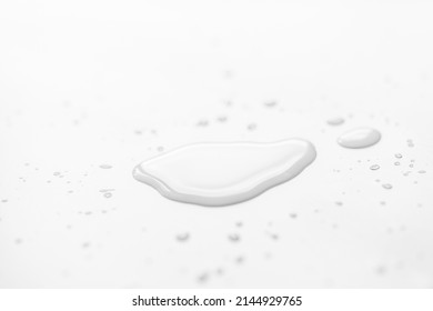 Water spilled on a white table - Shutterstock ID 2144929765