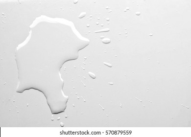 Water spilled on white table