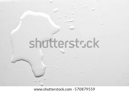 Water spilled on white table