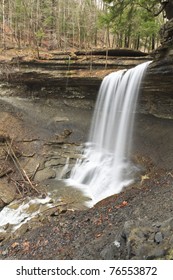 Water Spills Smoothly Ofver A 50' Overhang At Tinker Falls In Cortland County In New York State