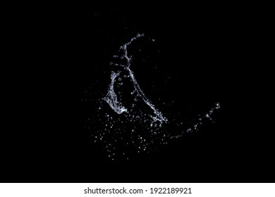 Water Splash Isolated On Black Background.