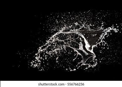 Water Splash On The Black background - Shutterstock ID 556766236