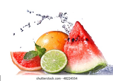 Water splash on  fresh fruits isolated on white