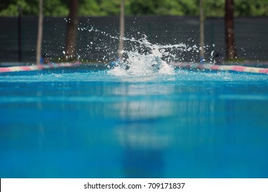 Water Splash At Swimming Pool