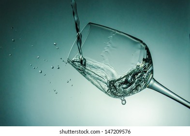 Water splash with wine glass  - Shutterstock ID 147209576
