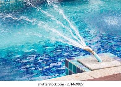 Water splashing into swimming pool