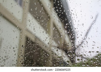 Water Spots On Glass With Blur Effect On Background