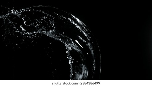 Water spurting out ans Splashing against Black Background