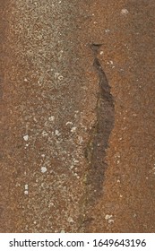 Water Stains On Sunlit Millstone Grit Rock Face