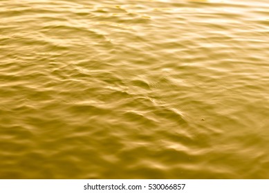 water of Still gold abstract background