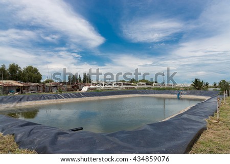 water storage on the man-made storage pond using black plastic on foundation to protect water absorbing to underground