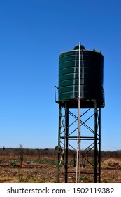 Water storage tank with blue sky background