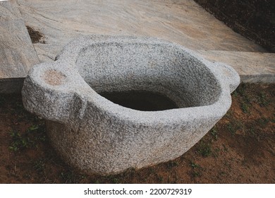 Water Storage Tub Made Of Stone, Closeup Shot With Partially Filled Water.