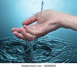 Water Stream On Woman Hand