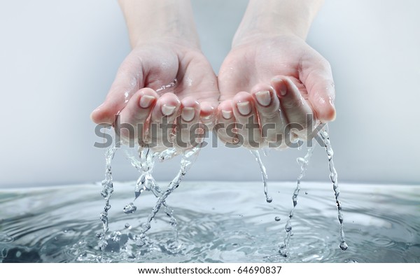 water stream on woman\
hand
