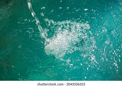 Water Stream Running In Swimming Pool Blue Surface