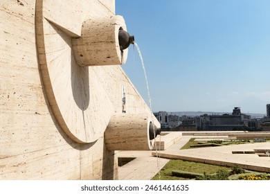 Water streams from the Cascade, embracing Yerevans skyline under a serene sky. - Powered by Shutterstock