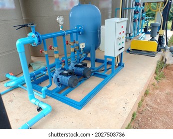  water supply equipment.
Automatic water pump control cabinet.  pipe water system. Blue device for irrigation water supply.