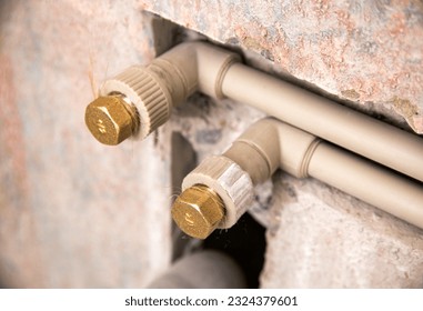 Water supply in polypropylene pipes in a concrete wall. Silencers.