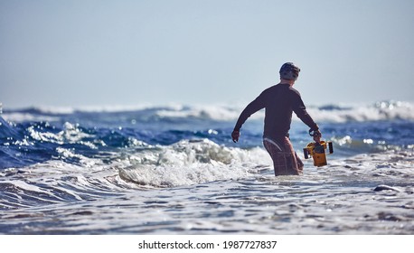 Water Surf Photographer Get Footage On A Day With Large Waves. Water Sport Activity. Atlantic Ocean, Dominican Republic. 30.12.2016.