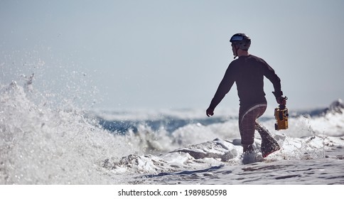 Water Surf Photographer Get Footage On A Day With Large Waves. Water Sport Activity. Atlantic Ocean, Dominican Republic. 30.12.2016.