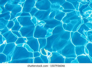 The Water Surface Is The Blue Ripple Of The Swimming Pool In The Morning.